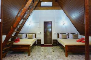 Letto o letti in una camera di Sigiri Sky Home & TreeHouse