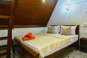 Letto o letti in una camera di Sigiri Sky Home & TreeHouse