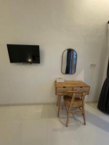 TV a/nebo společenská místnost v ubytování Bayedan Homestay