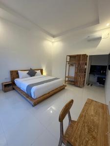 Postel nebo postele na pokoji v ubytování Bayedan Homestay