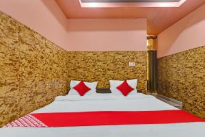 Ένα ή περισσότερα κρεβάτια σε δωμάτιο στο Hotel O Shamsher Palace
