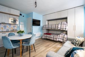 Ένα ή περισσότερα κρεβάτια σε δωμάτιο στο Sendy Home Roccaraso 2