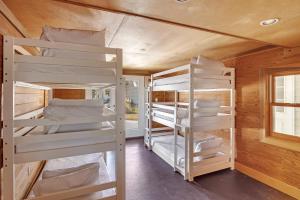 Postel nebo postele na pokoji v ubytování Ole River Cottage