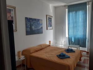 Postel nebo postele na pokoji v ubytování Camera vista San Pietro