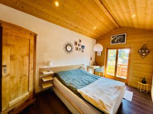 Postel nebo postele na pokoji v ubytování Chalet EVEREST
