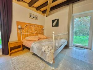 Postel nebo postele na pokoji v ubytování Gîte des Fours