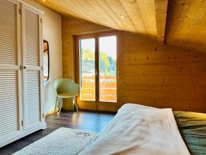 Postel nebo postele na pokoji v ubytování Chalet EVEREST