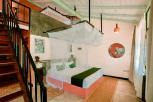 Postel nebo postele na pokoji v ubytování Boho Jungle Studios