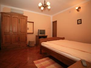 Posteľ alebo postele v izbe v ubytovaní Apartments Vrata Baranje