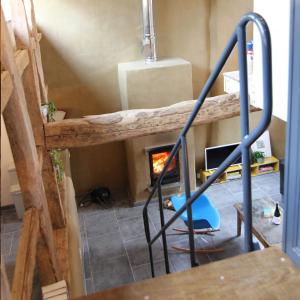 an overhead view of a room with a fireplace at fantastische vakwerk boerderij nabij Maastricht in Banholt