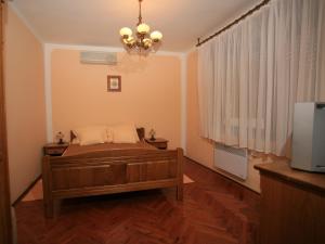 Televízia a/alebo spoločenská miestnosť v ubytovaní Apartments Vrata Baranje