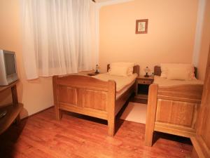 Posteľ alebo postele v izbe v ubytovaní Apartments Vrata Baranje