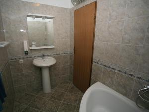 Kúpeľňa v ubytovaní Apartments Vrata Baranje