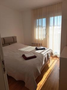 Postel nebo postele na pokoji v ubytování Apartman 1