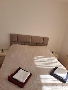 Postel nebo postele na pokoji v ubytování Apartman 1