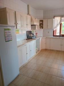 Kuchyň nebo kuchyňský kout v ubytování Departamento amoblado en segundo piso + 6 fotografií