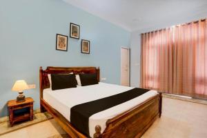 Voodi või voodid majutusasutuse The Boho Udaipur toas