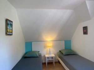 Letto o letti in una camera di Appartement, 2 chambres, Terrasse vue mer, très calme, Piscine premium, accès direct aux plages, restaurants, Village Vacances
