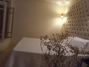 Postel nebo postele na pokoji v ubytování CORTESE HOTEL