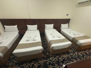 Letto o letti in una camera di فندق غالب المشاعر