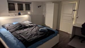 Postel nebo postele na pokoji v ubytování Sleep In Lynge