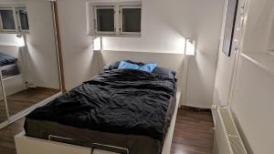 Postel nebo postele na pokoji v ubytování Sleep In Lynge