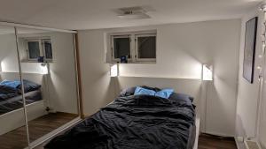 Postel nebo postele na pokoji v ubytování Sleep In Lynge
