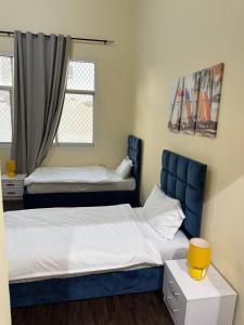 Giường trong phòng chung tại Lunar Beach Hostel