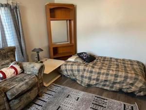 En eller flere senge i et værelse på Maryland Homestay - Downtown Apartment