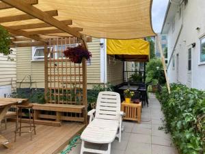 En balkon eller terrasse på Maryland Homestay - Downtown Apartment