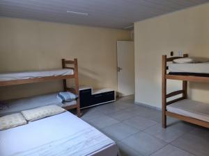 En eller flere senge i et værelse på Casa Mobiliada Oceania + 17 billeder