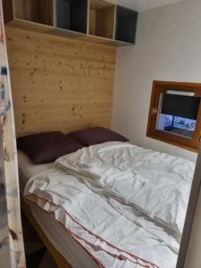 Postel nebo postele na pokoji v ubytování Les Grenadines 2