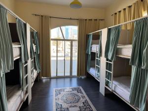 Postel nebo postele na pokoji v ubytování Lunar Beach Hostel