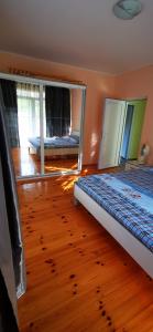 Postel nebo postele na pokoji v ubytování Villa Nadija + 37 fotografií