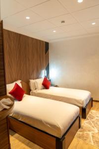 Katil atau katil-katil dalam bilik di Hotel Charf