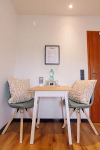 TV a/nebo společenská místnost v ubytování Comfort Hub - Homestay - 3 Gästezimmer im Eigentumshaus