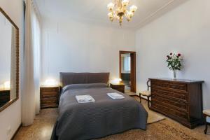 เตียงในห้องที่ Residenza Dei Dogi