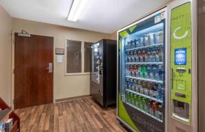 a vending machine filled with lots of bottles of soda at Extended Stay America Suites - Chicago - Buffalo Grove - Deerfield in Riverwoods