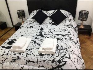 Postel nebo postele na pokoji v ubytování Depto Palermo Sinclair EEUU Parking included