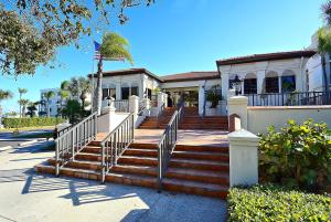 a house with stairs in front of it at Land's End 5-204 Gulf-Bay Front - Premier in St. Pete Beach