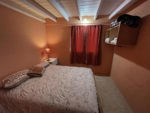 Postel nebo postele na pokoji v ubytování Cabañas El portal