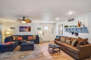 a living room with a couch and a table at Pelican Pointe 2C in Clearwater Beach