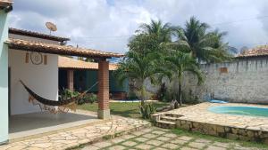 エスタンシアにあるCentro Aquatico Aratuのヴィラ(家の前にスイミングプール付)