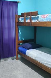 Postel nebo postele na pokoji v ubytování Casa Maipú