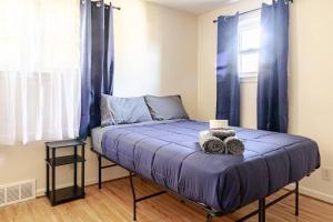 Postel nebo postele na pokoji v ubytování Comfortable Private Rooms in Rochester