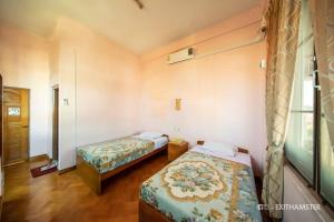 Ένα ή περισσότερα κρεβάτια σε δωμάτιο στο Gypsy Inn