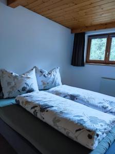 Postel nebo postele na pokoji v ubytování Apartment Weitblick - Cosy 65m2 appartment with balcony