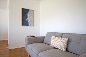 A seating area at Morgan Abode - Walk to CBD, Modern Escape