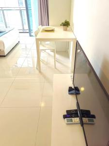 Foto Kuala Lumpuris asuva majutusasutuse SUNU温馨大床房KLcc双峰塔6分钟轻轨旁泳池 带阳台 galeriist