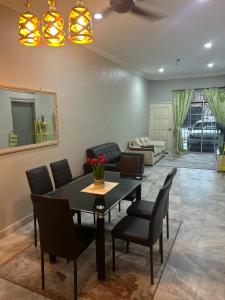 Χώρος καθιστικού στο Hz Homestay Bertam